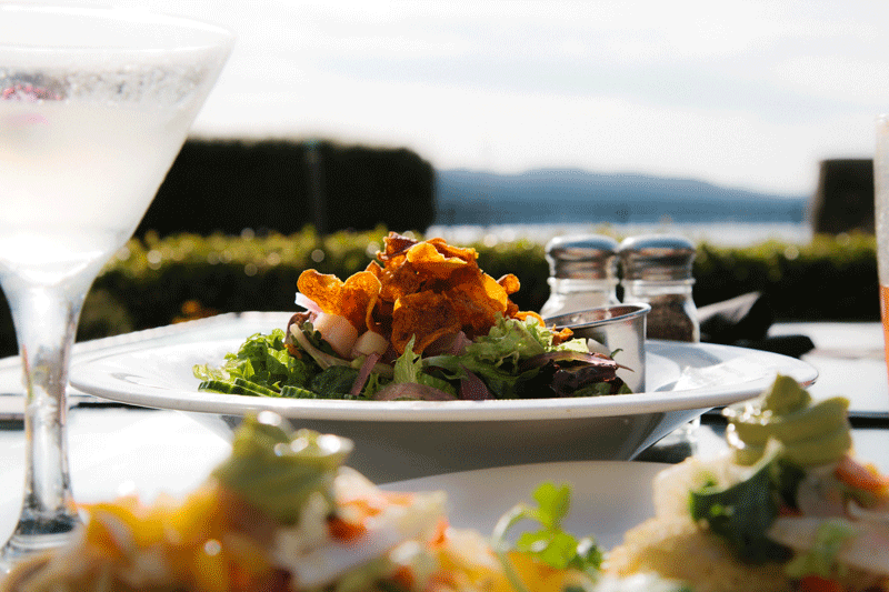 salad plate at dining table with ocean views