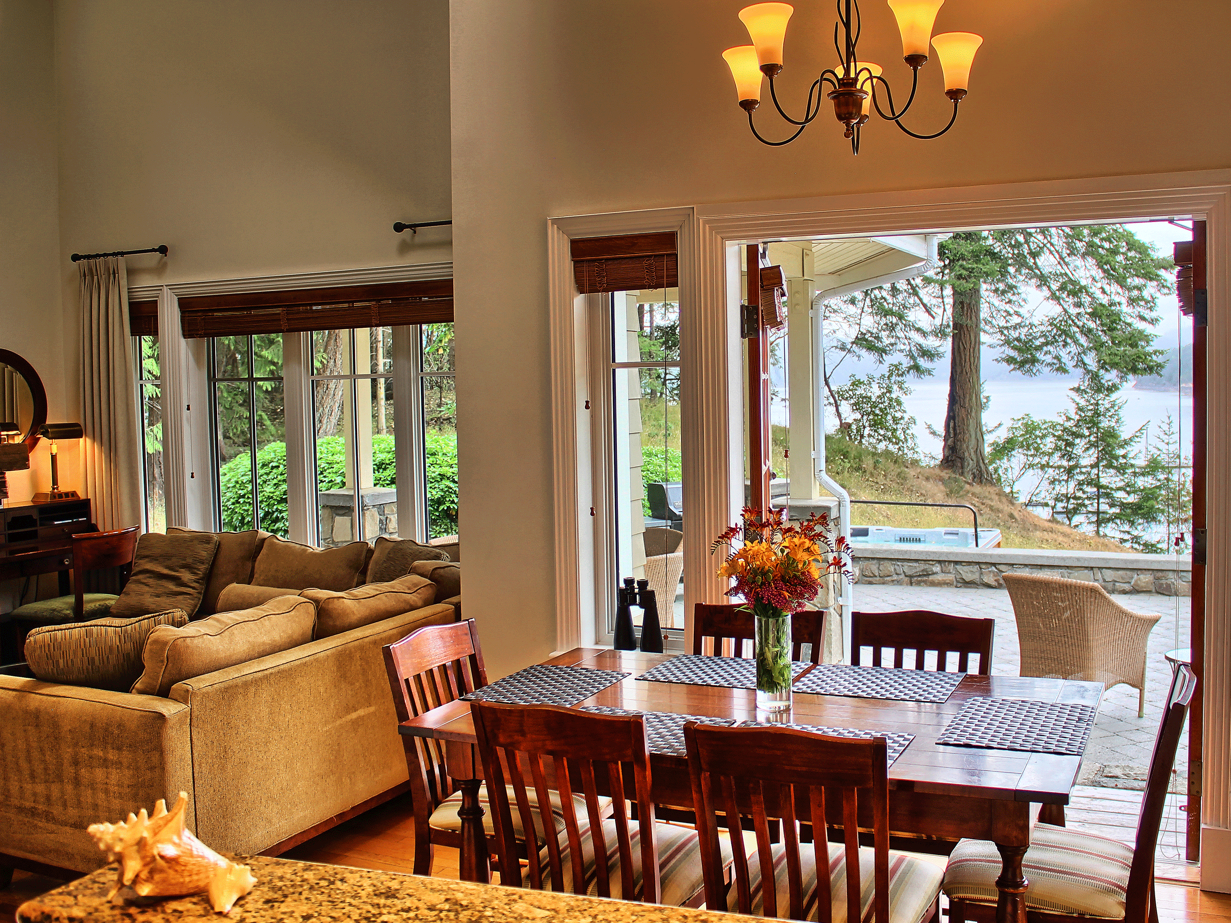 kitchen table with view of outside lake