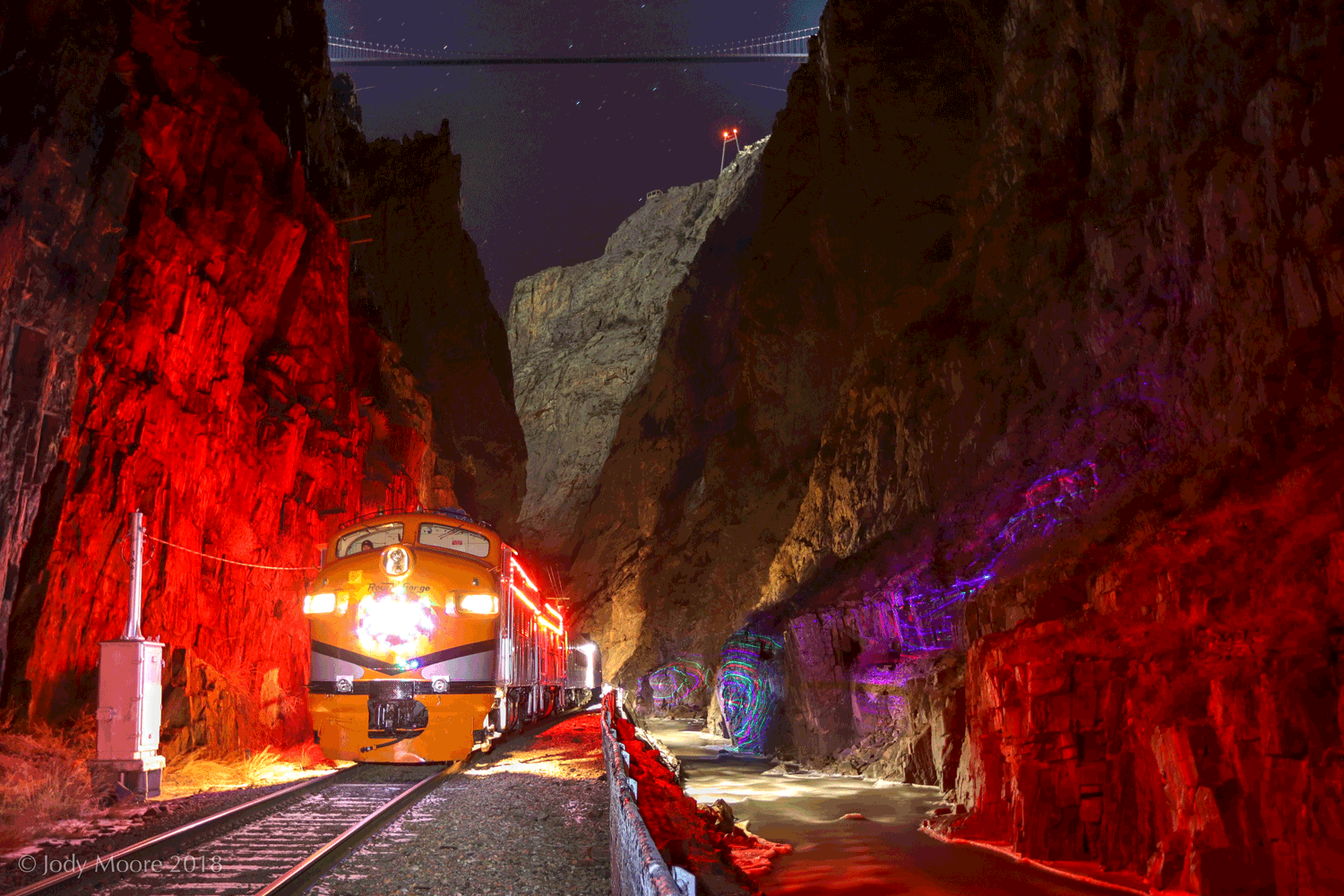 Running train in the night near Kinship Landing