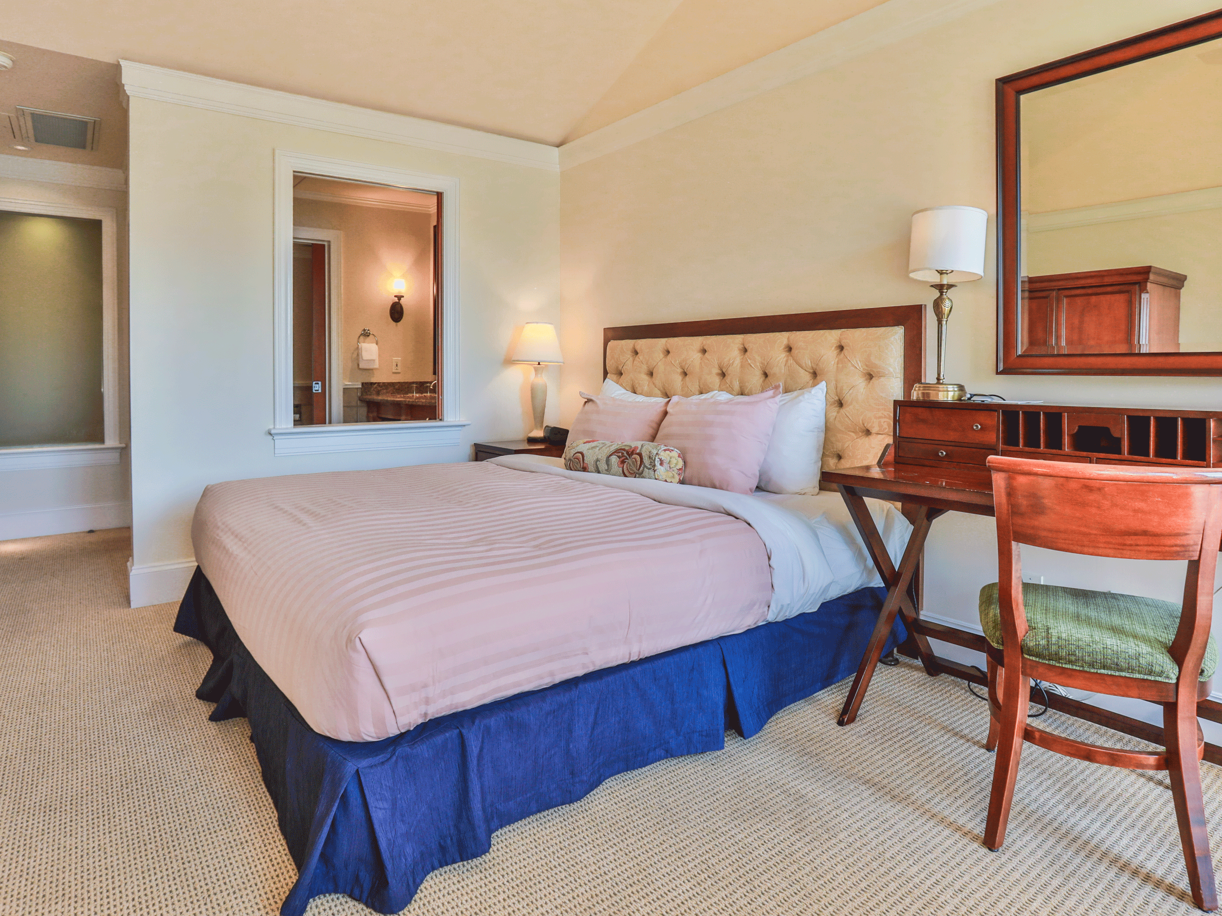 pink bed in hotel room