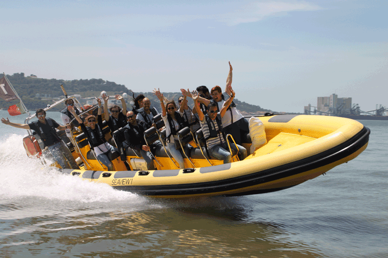 People rafting on the sea near Hotel Cascais Miragem Health & Spa