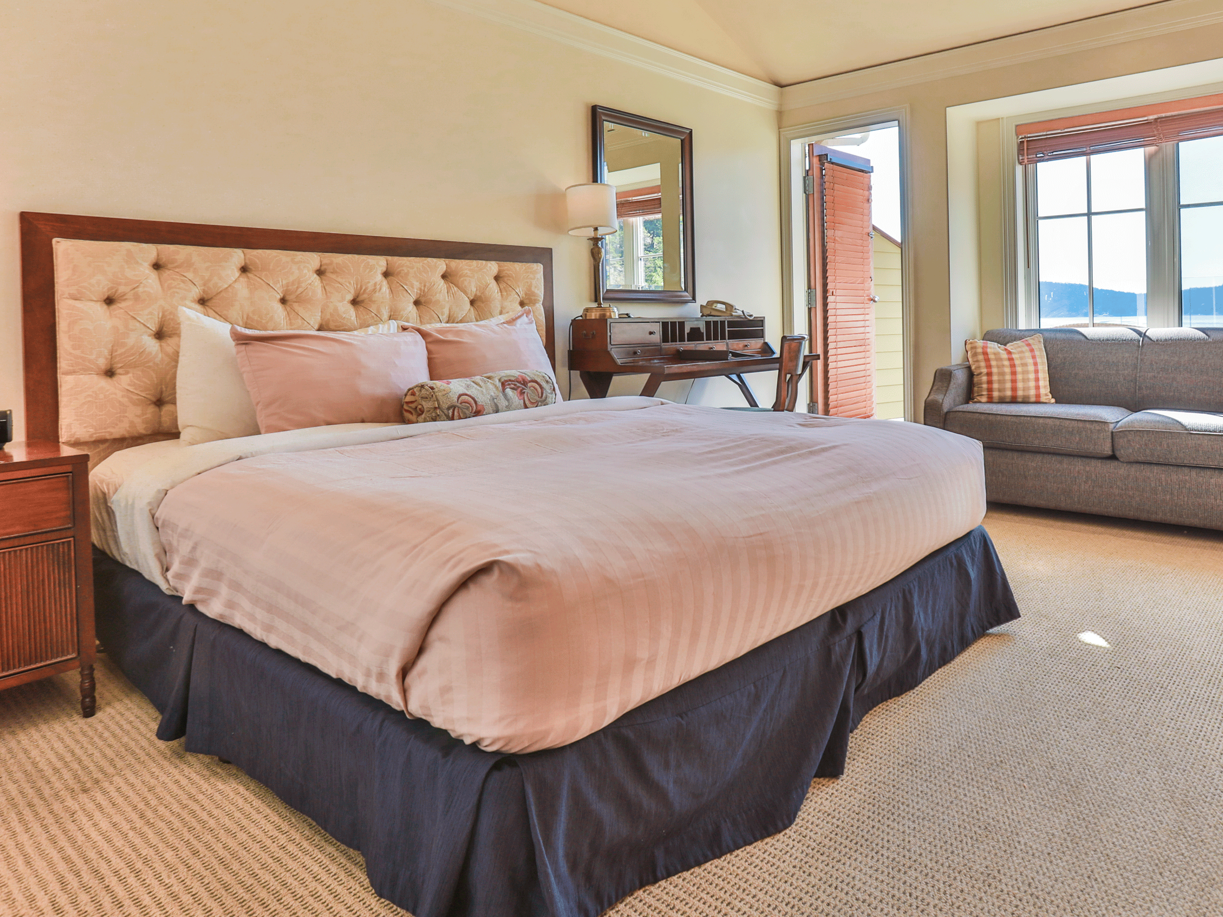 pink bed in hotel room