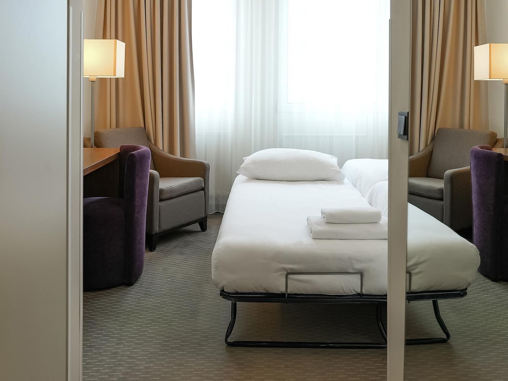 Entrance to triple room, suitable for family stays at Hotel Sylter Hof Berlin