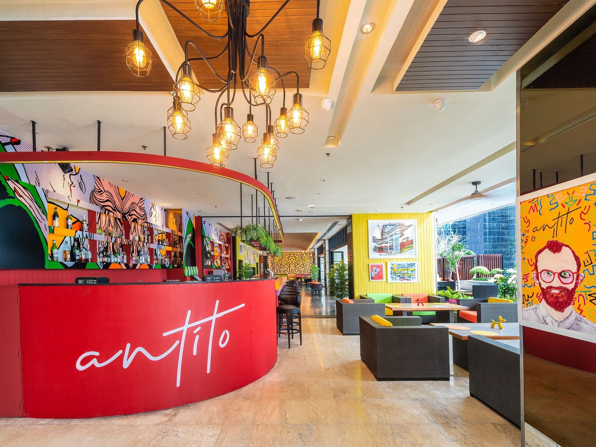 Antito Bangkok lobby with eclectic decor, bar area, and modern seating arrangements at Eastin Grand Hotel Sathorn