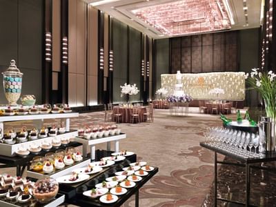 Ballroom-I with round tables & buffet at Okura Prestige Bangkok