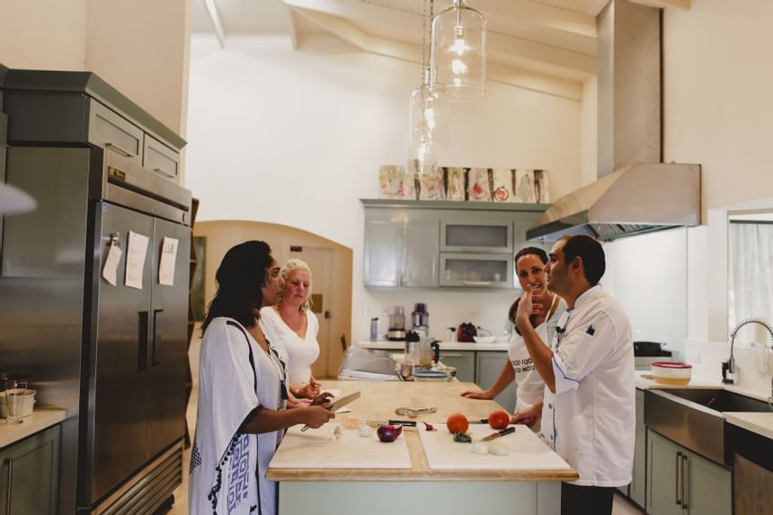 Chef speaking to guests in the kitchen at Retreat Costa Rica