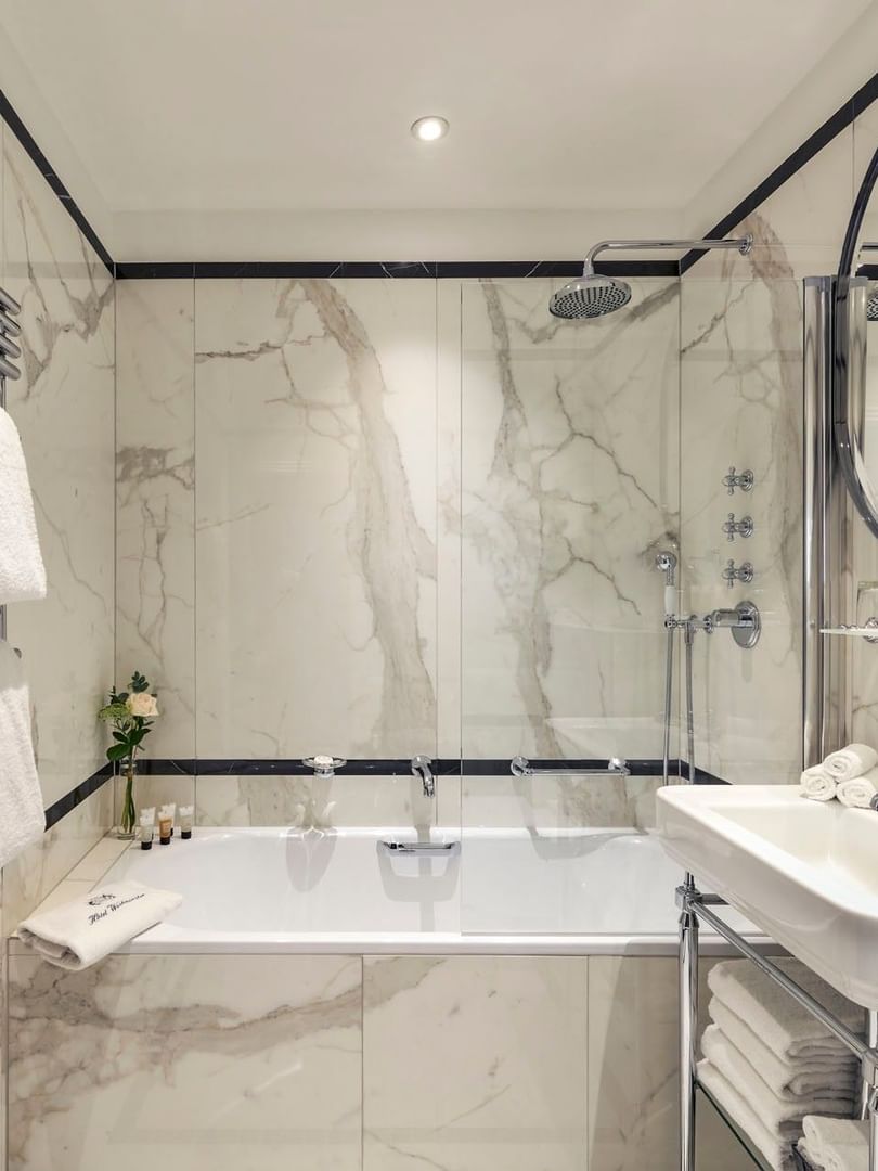 Superior Double Room bathroom  featuring a vanity with a bathtub at Hotel Westminster Paris