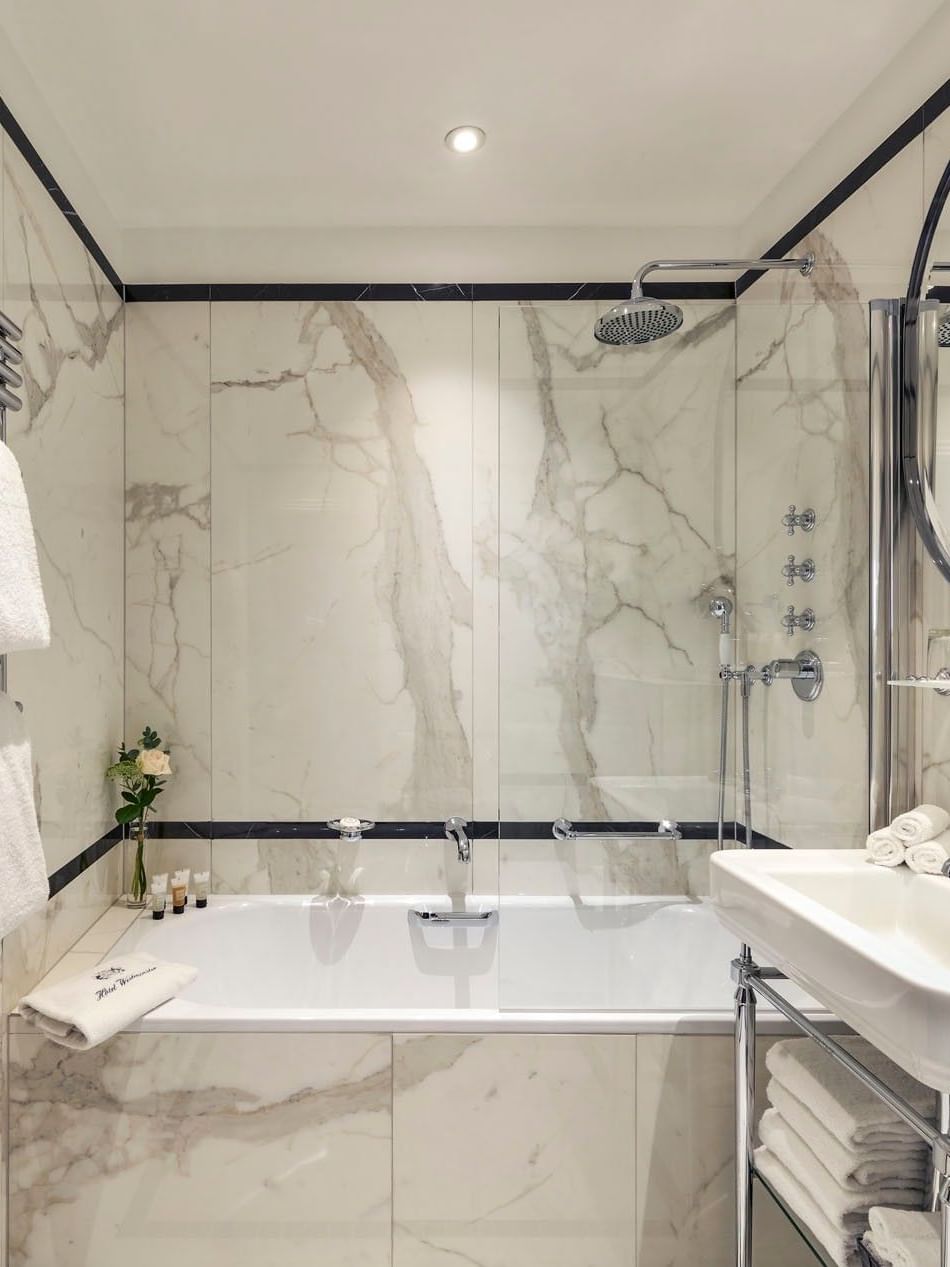 Superior Double Room bathroom  featuring a vanity with a bathtub at Hotel Westminster Paris