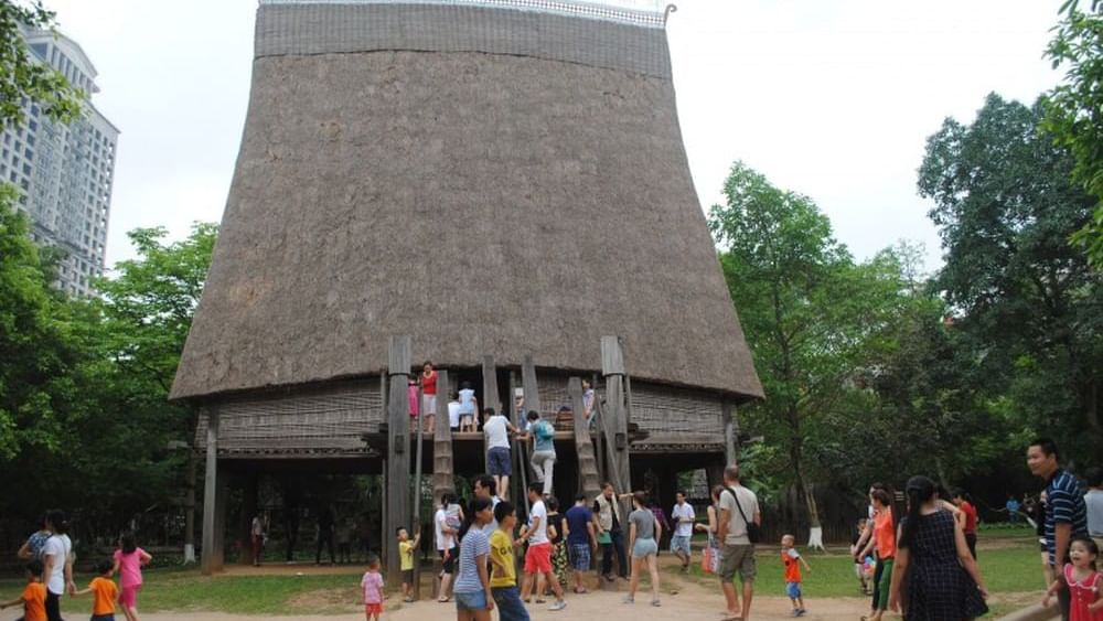 People entering & exiting Vietnam Museum of Ethnology near Sunway Hotel Hanoi