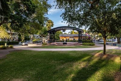 Pioneer Park with a gazebo on stone steps, surrounded by lush greenery near The J Hotel, featuring things to do in Dunedin