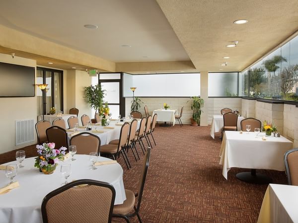 Dining tables set up at event