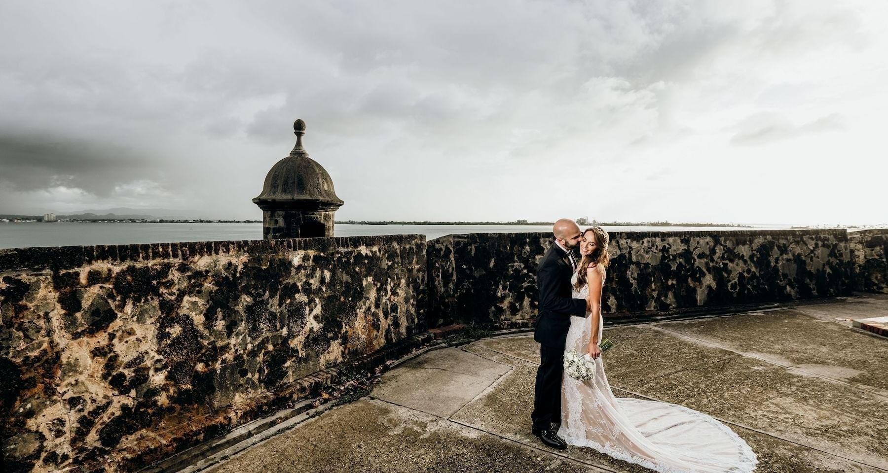 Couple posing for a photo near Hotel El Convento