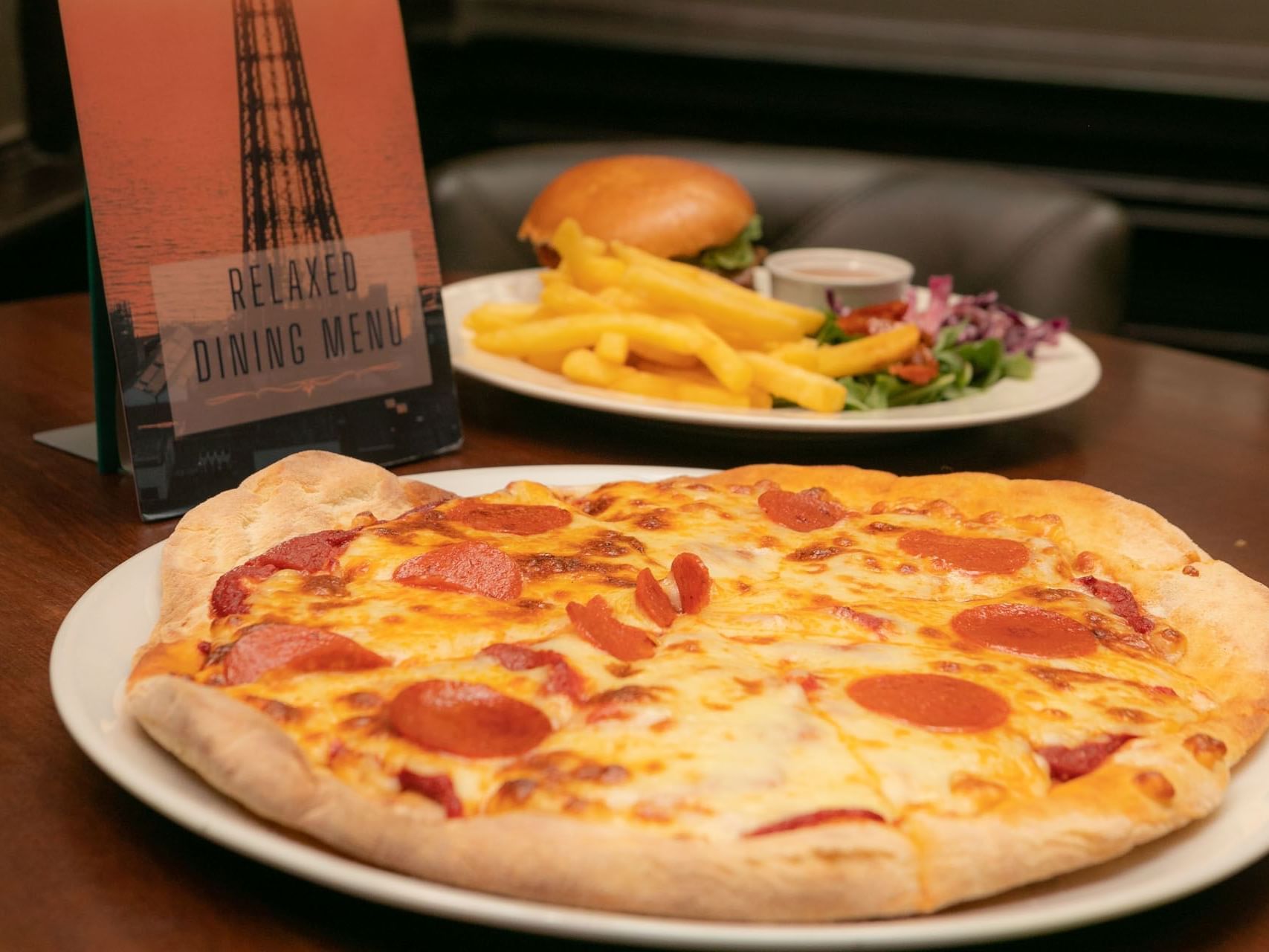 Pizza with burger served in bar, The Imperial Hotel Blackpool
