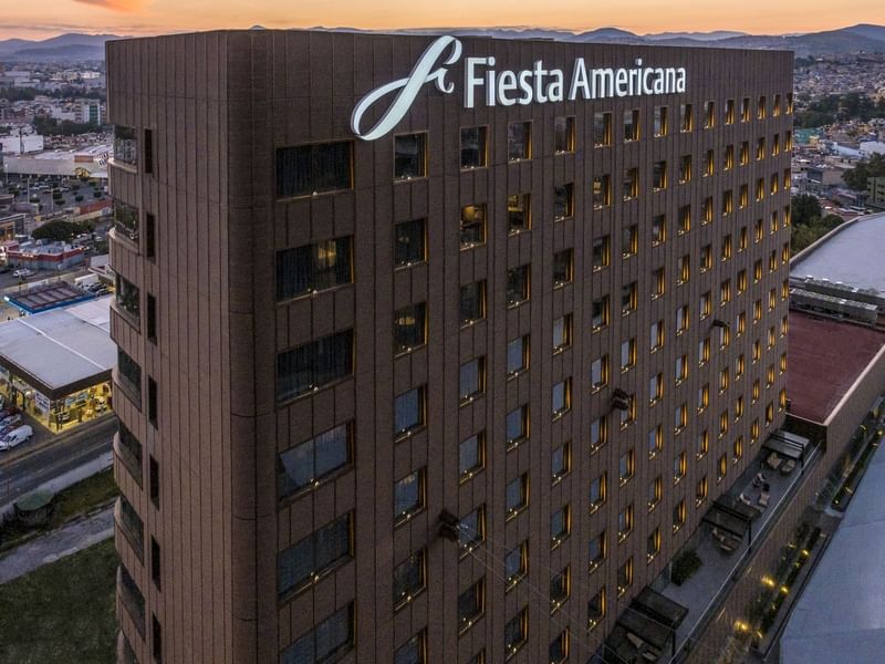 Exterior view at Fiesta Americana façade with a rooftop sign