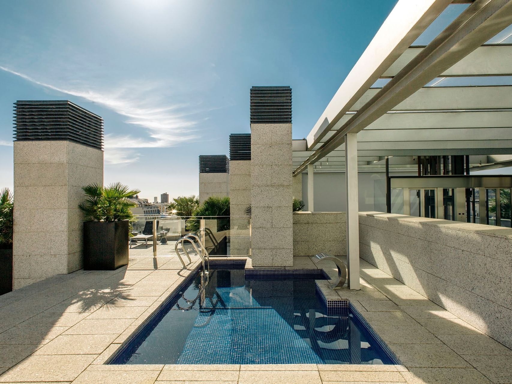Outdoor pool area in the rooftop at Aparthotel Republica
