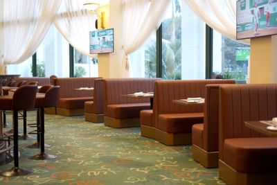 Palm Court Lobby Lounge dining area at Hanoi Daewoo Hotel