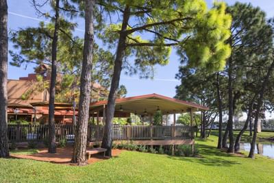 Scenic lake view of Rosen Inn Lake Buena Vista & lawn