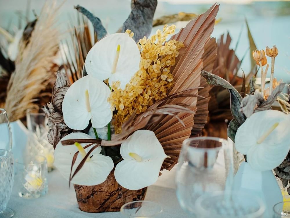 Flower decorations on a wedding table at Grand Fiesta Americana