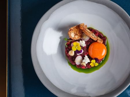 Close-up of a fine Beetroot Tartare served in the restaurant at The Capital Hotel London