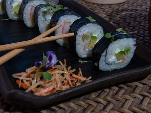 Tortugas restaurant's sushi dish close-up with chopsticks at Hacienda del Mar Los Cabos