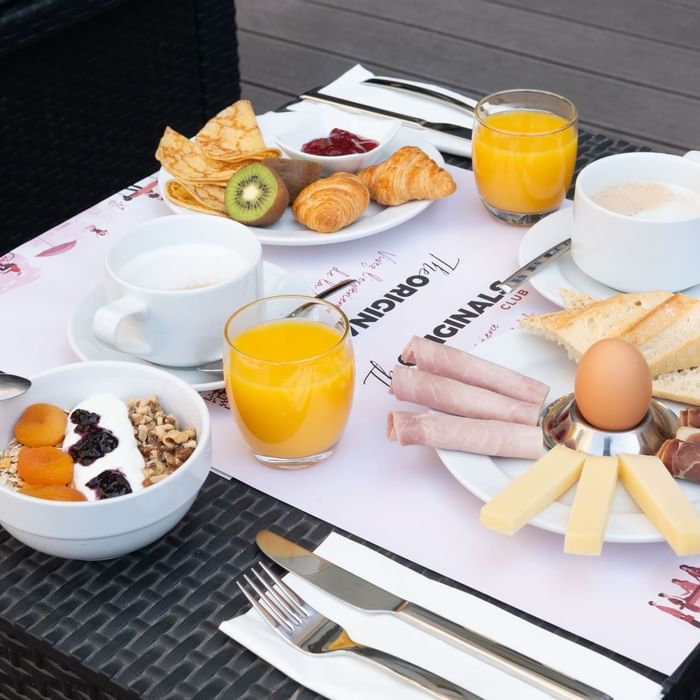 Close-up of a breakfast served at The Originals Hotels