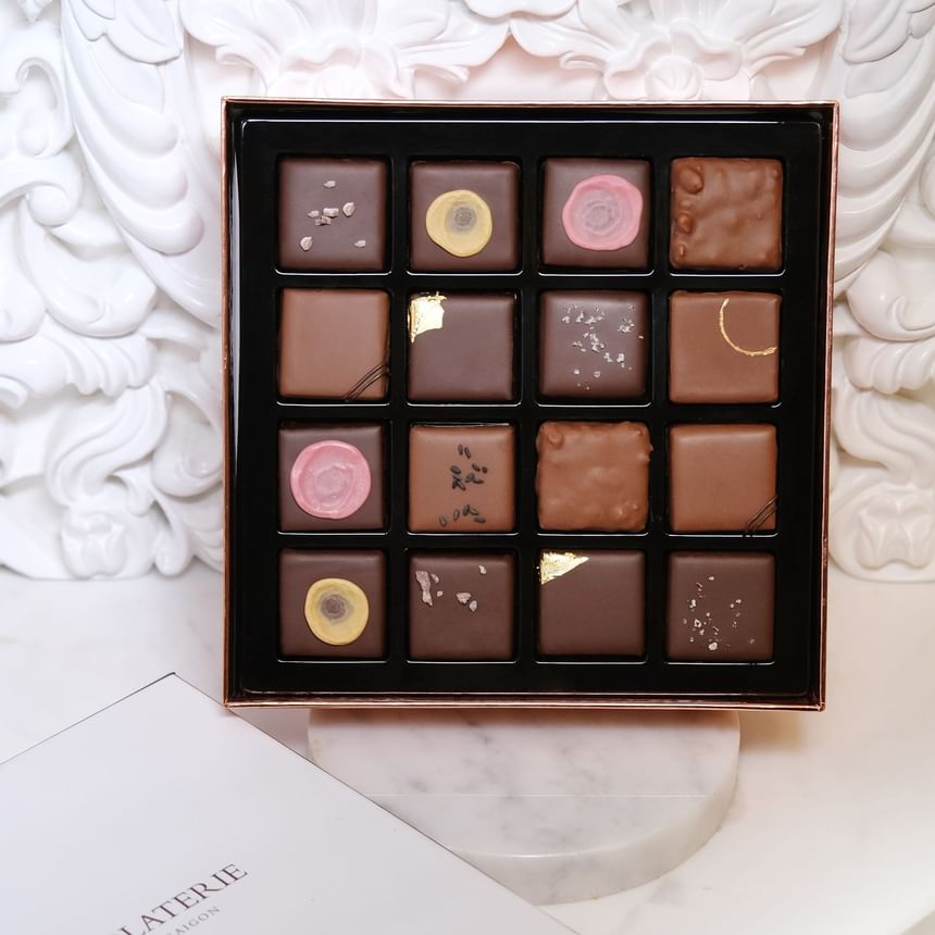 Elegant black box filled with topped chocolates in Chocolaterie at Park Hyatt Saigon