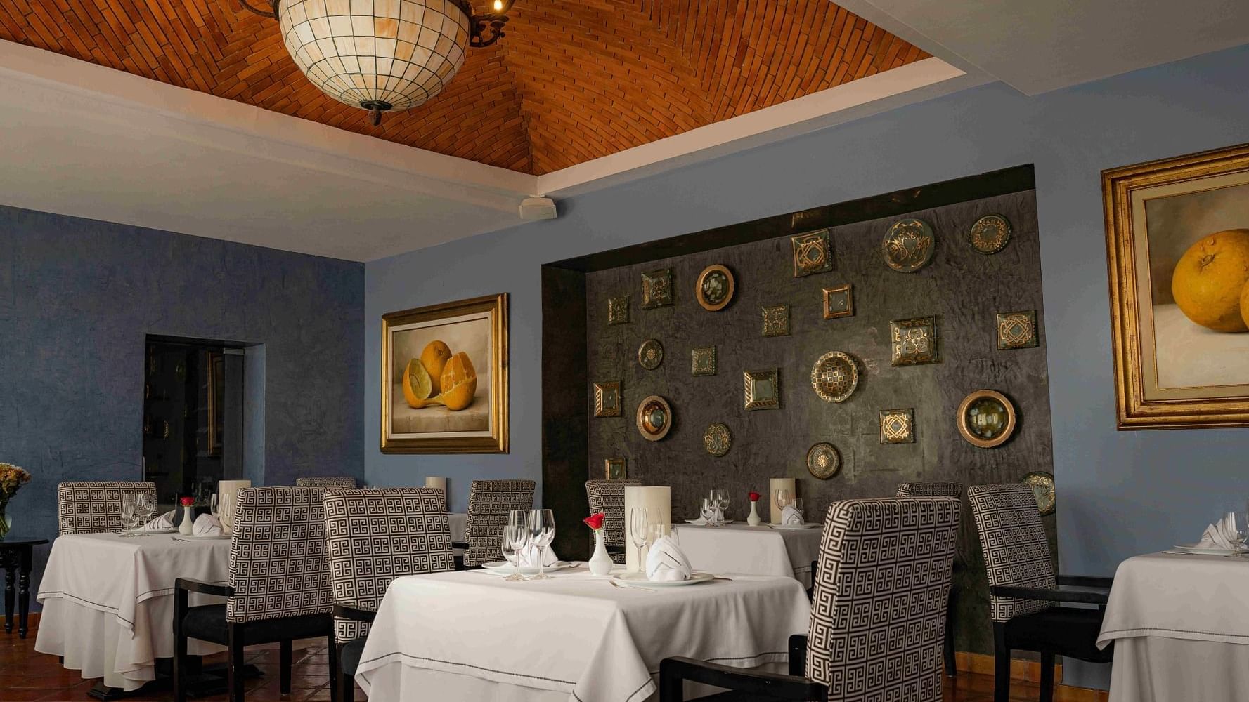 Elegant interior with decorative walls in Canto Del Mar restaurant at Marquis Los Cabos Resort