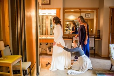 A bride dressing in dress for weeding at Sleeping Lady