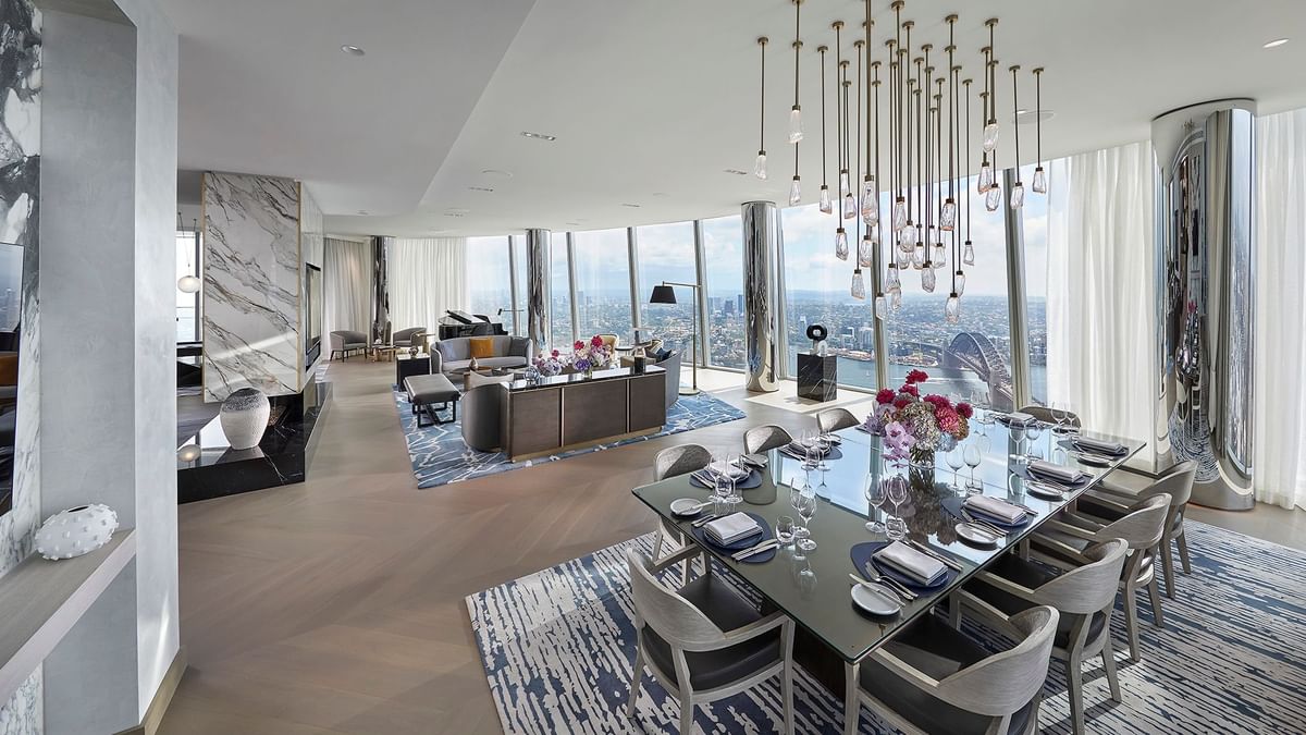 Crown Presidential Villa with expansive city views, dining setup, and modern decor  