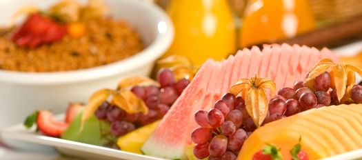 Fruit plate served with grapes & melons at Aava Whistler Hotel