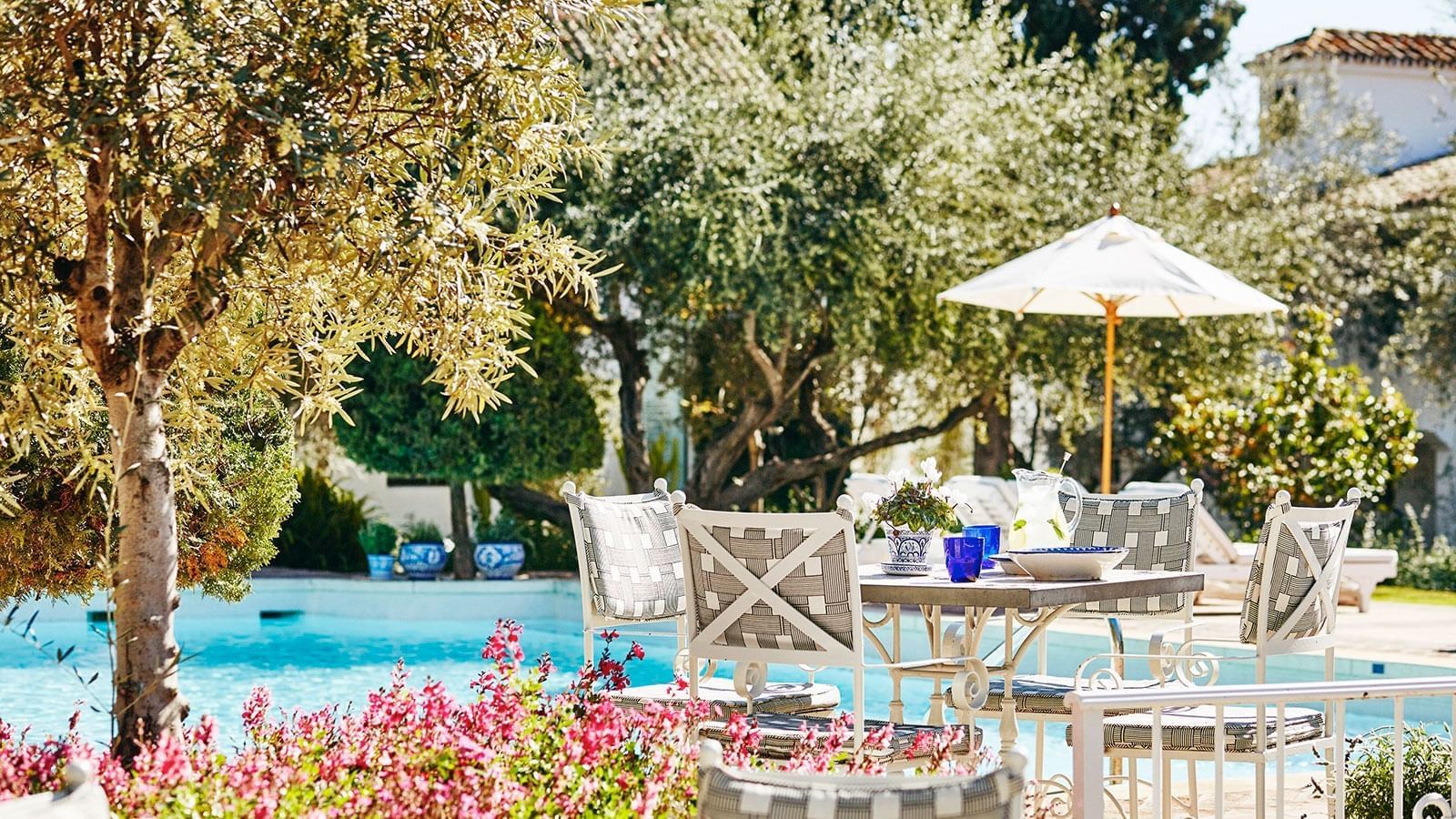 Garden pool lounge area by the pool at Marbella Club