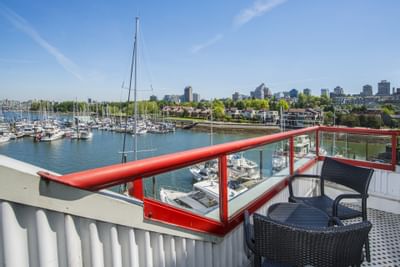 The waterfront balcony lounge area at Granville Island Hotel