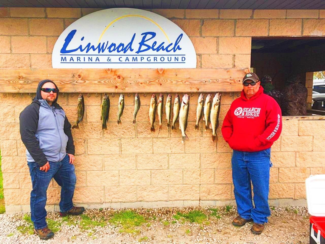 Men at sports & fishing charter service near Evergreen Resort 