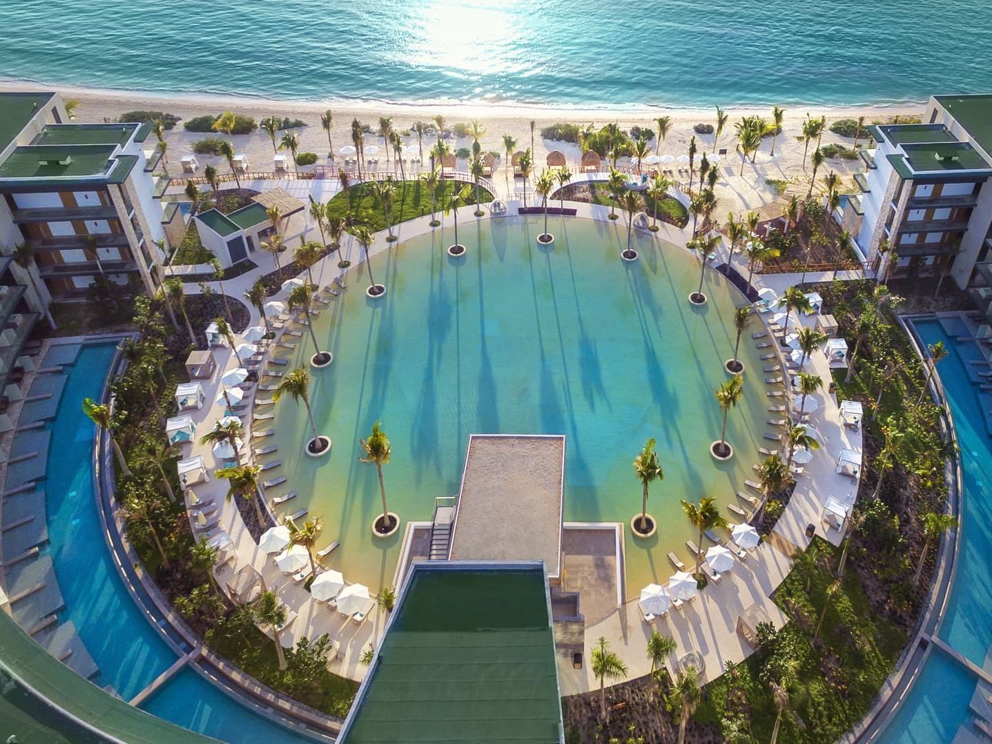 Aerial view of the circular pool and hotel Haven Riviera Cancun