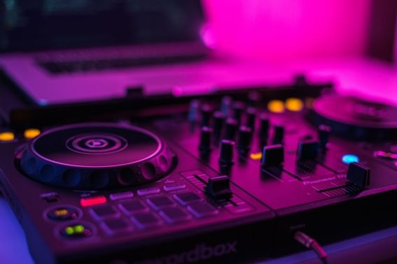 Close-up on a DJ console with lights at The Rockaway Hotel