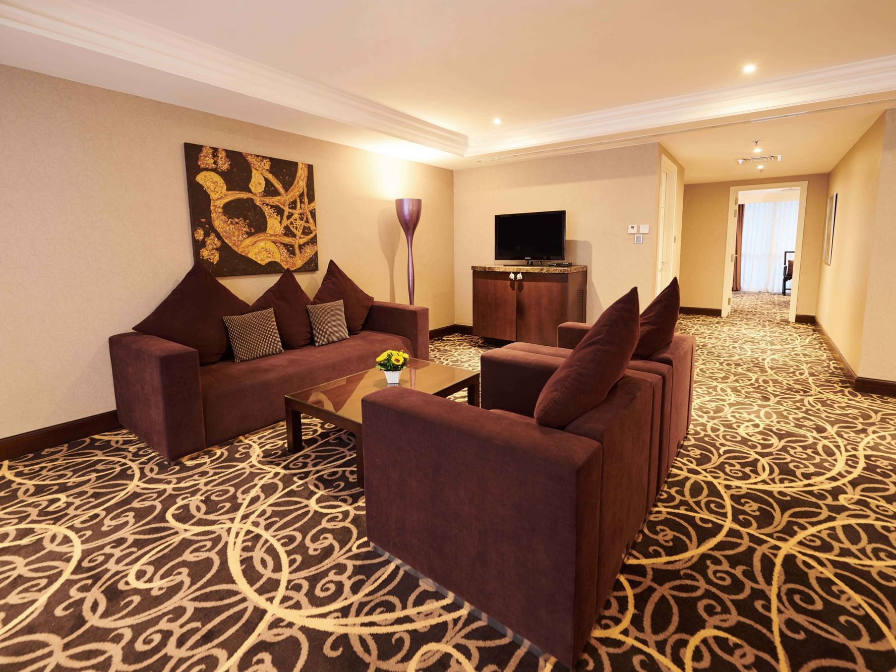 Living area with sofas in Club Grand Executive Suite at Eastin Grand Hotel Saigon