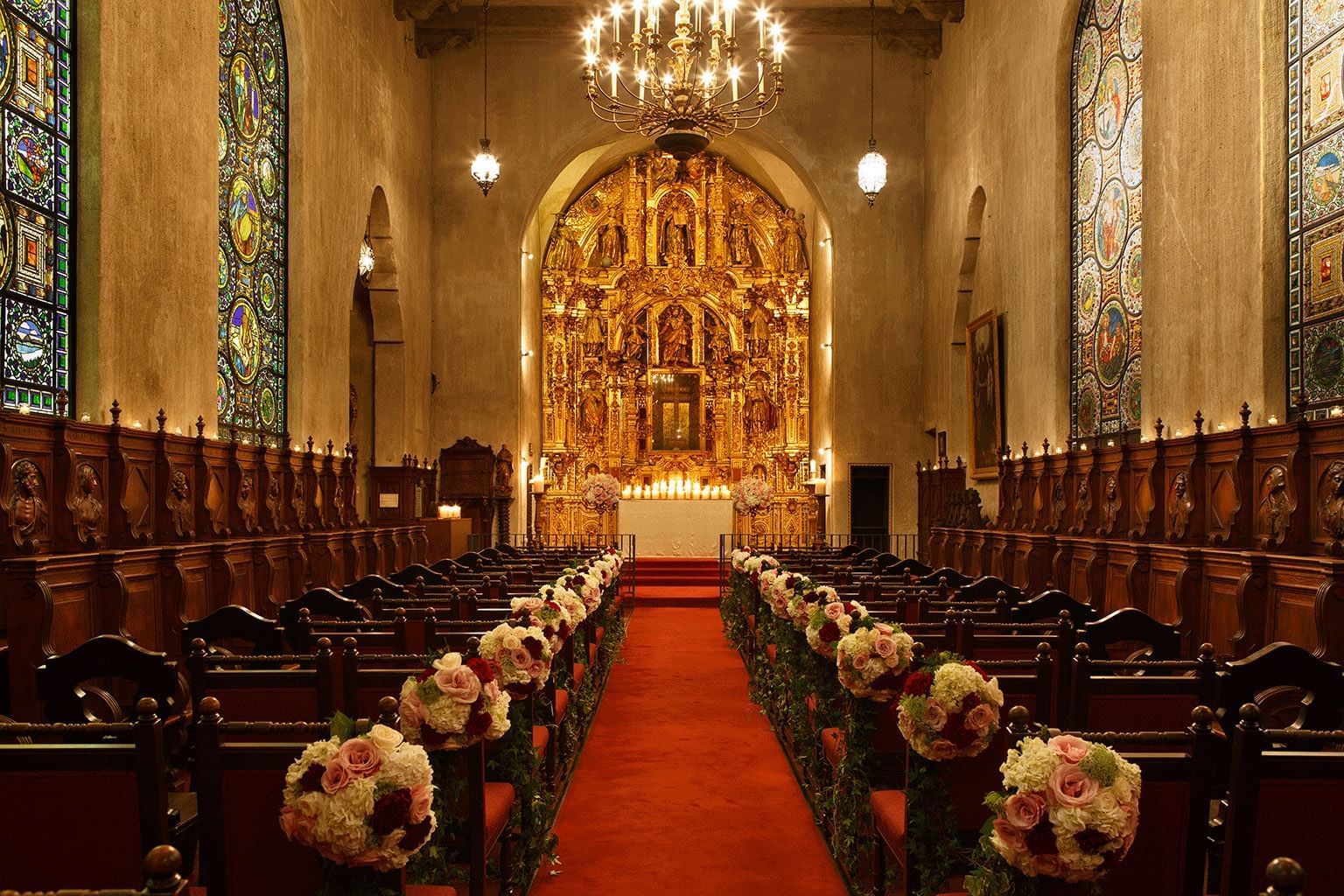 St. Francis of Assisi chapel with flowers decorating the aisle
