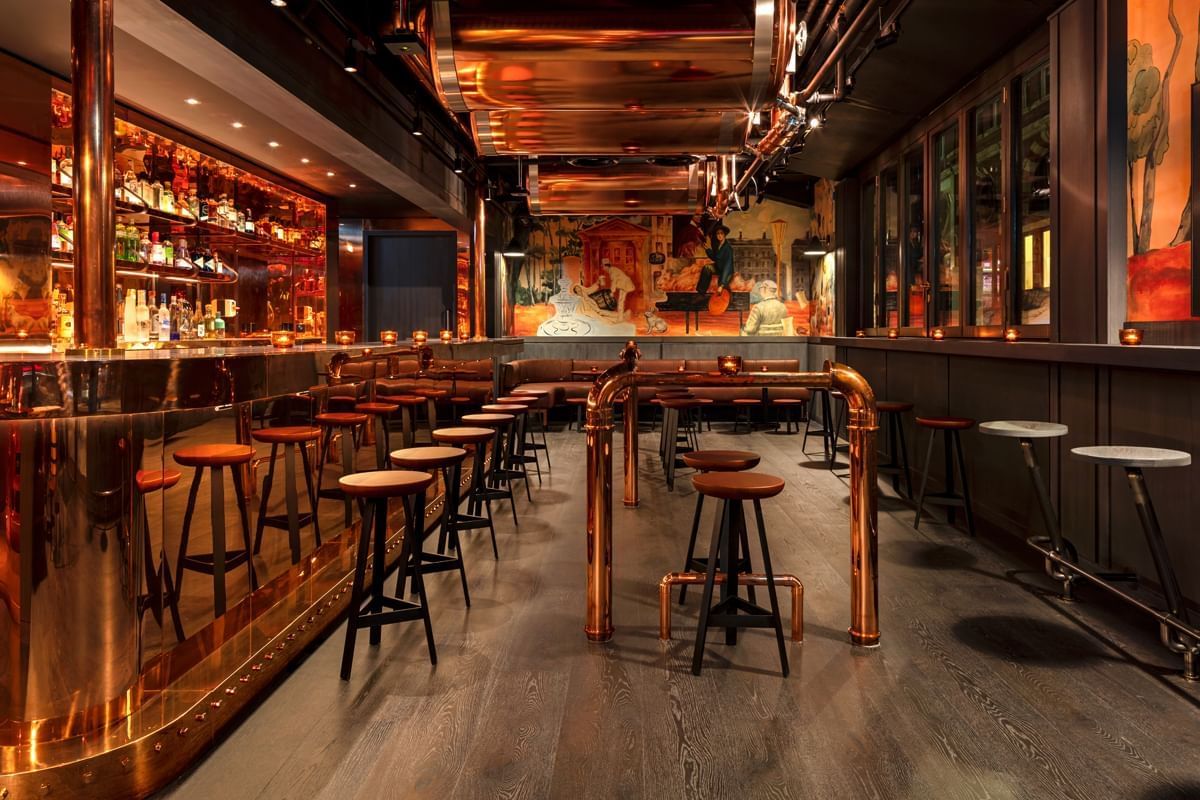 Bar counter & lounge area in Joshua's Tavern at The Londoner