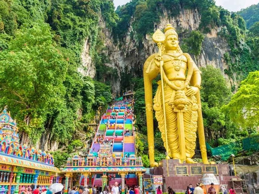 People by the Arulmigu Murugan Statue in Batu Caves, Famous places to visit in Kuala Lumpur near Imperial Lexis