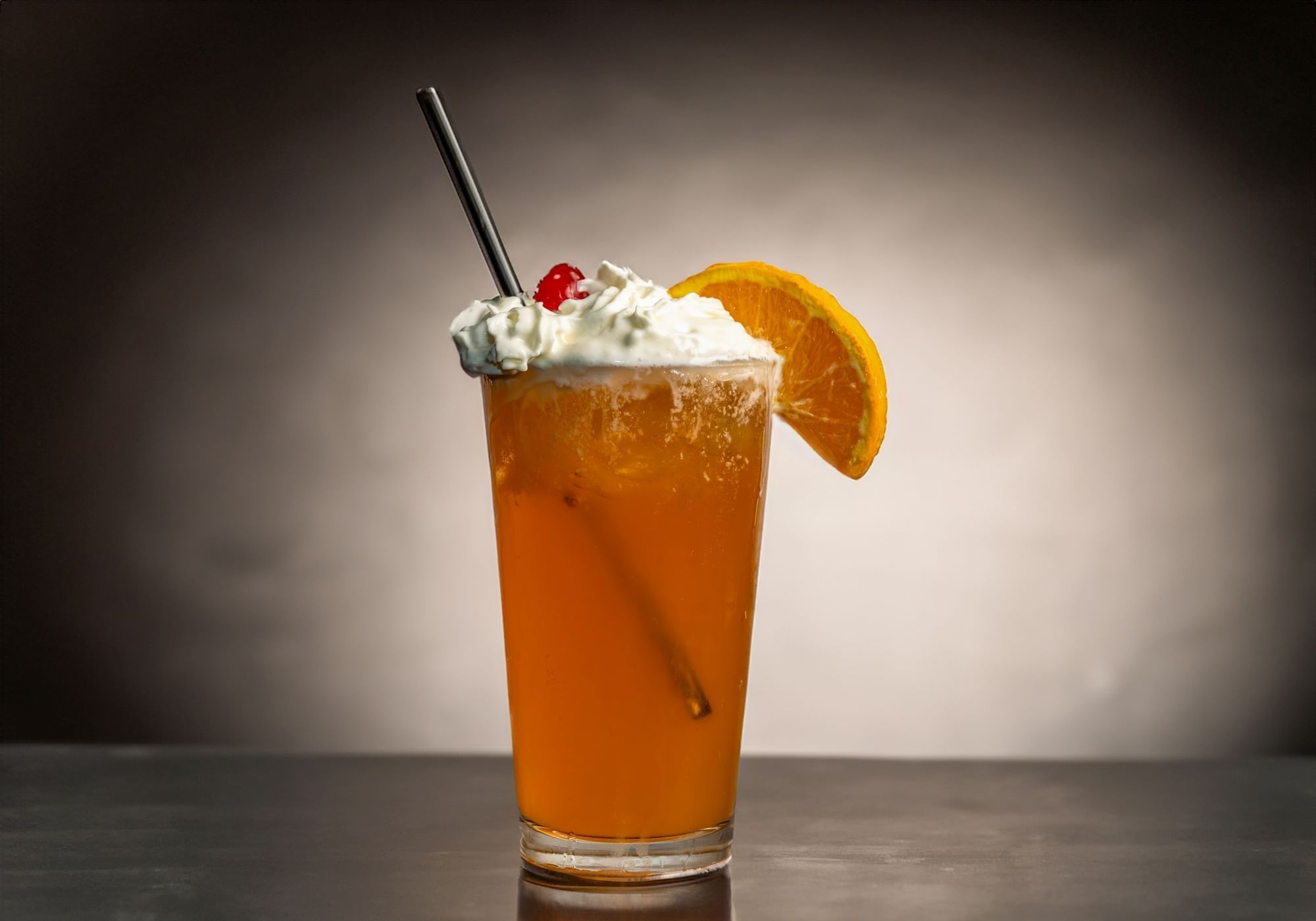 A photo of the Orange Creamsicle 50th anniversary cocktail at Rosen Inn at Pointe Orlando.