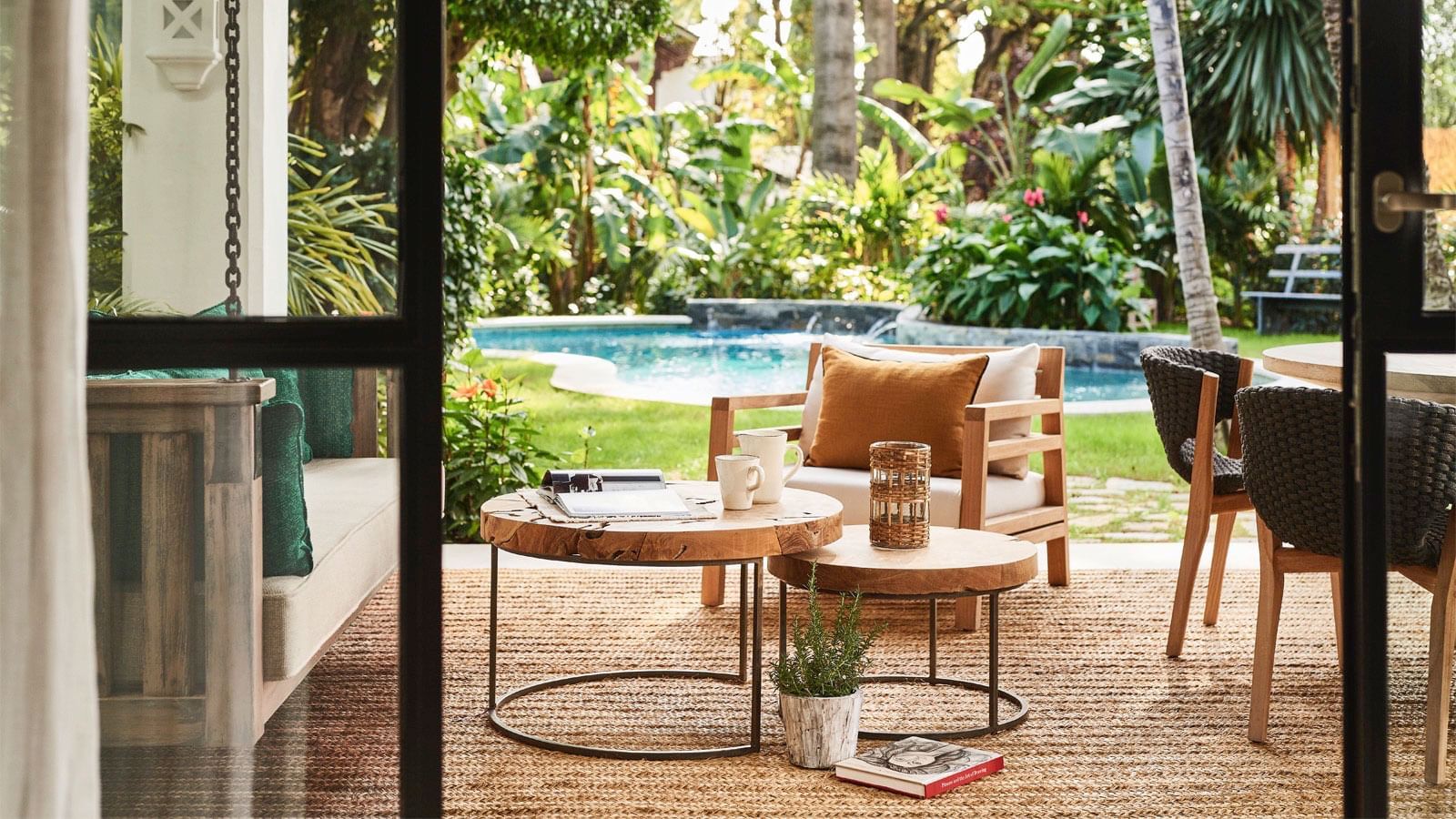Outdoor patio by the pool in Bel Air at Marbella Club