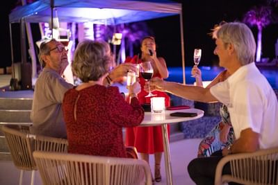 Guests clinking wine glasses, The Morgan Resort Spa Village