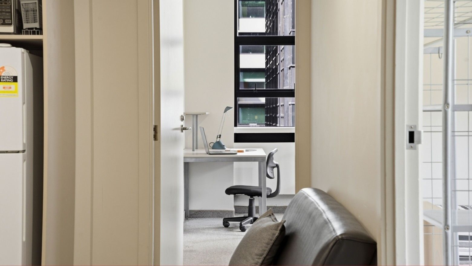 Office area with desk and chair in UniLodge Stafford House.