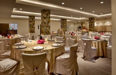 Banquet tables arranged for an event at Hotel Parq Central