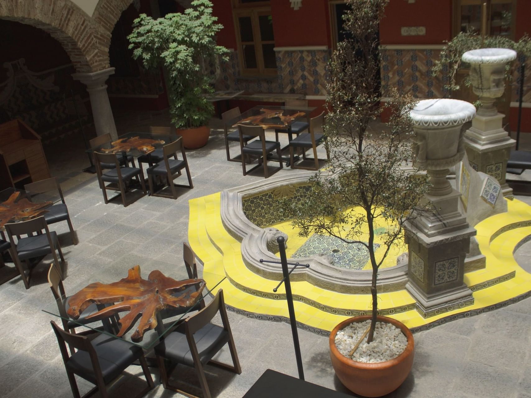 Tables in Azul Raiz Restaurant at Casa Azulejos Puebla Hotel