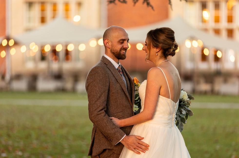 Bride and groom in gardens by flexitent at Easthampstead Park, a fantastic wedding venue in Berkshire