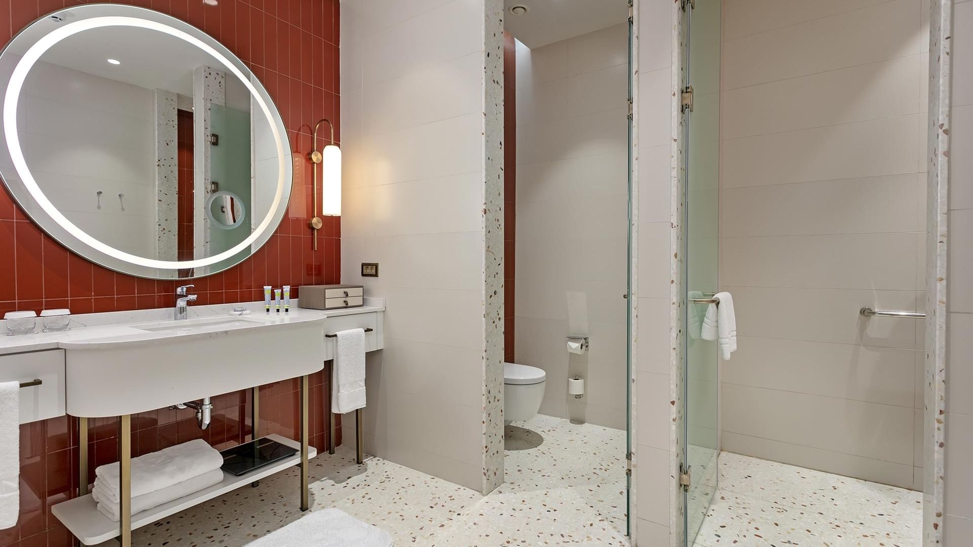 Bathroom with vanity & shower area in Lagoon Beach Swim-up Room at Cullinan Belek