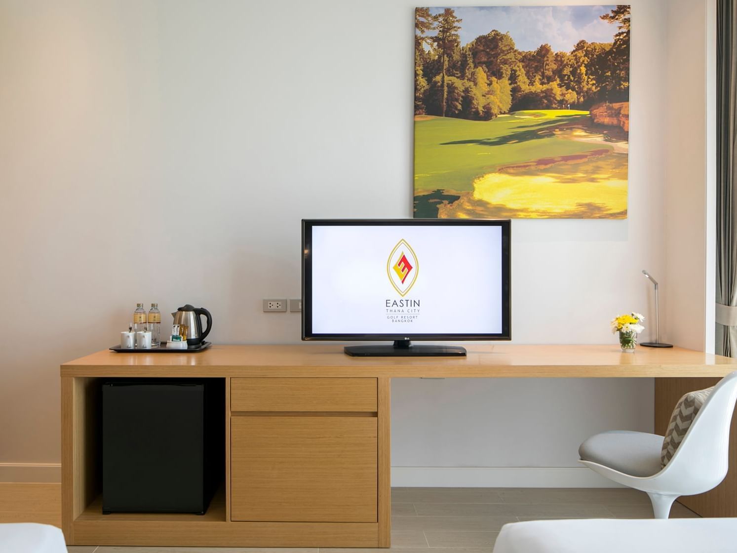 Coffee tray & TV on a desk in Superior Twin Room at Eastin Thana City Golf Resort Bangkok