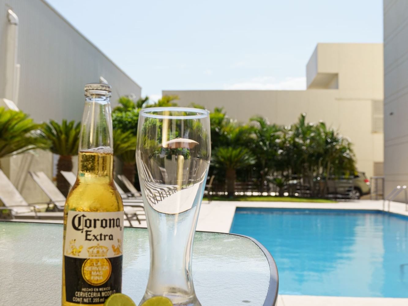 Beer & glass by the pool at Hotel Aeropuerto los Cabos