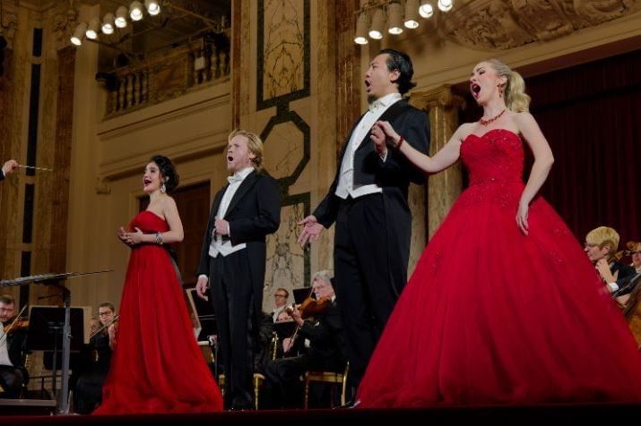New Year’s Eve concert at the Vienna Hofburg with opera singers, orchestra and festive stage atmosphere